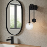 FELTON ARM WALL LIGHT BLACK — lifestyle