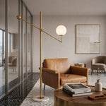 Kemi Floor Lamp in Black or Gold — lifestyle
