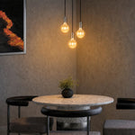 Lang Pendant Suspended Cord Set in Antique Brass, Black — lifestyle
