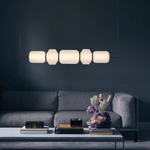 Torso LED Pendant Lamp 5Lt 26w in Black or Brass — lifestyle