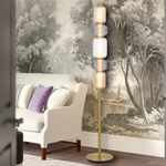 Torso LED Floor Lamp 26w in Black or Brass — lifestyle