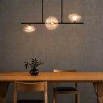 Zecca 3Lt Pendant Light Horizontal in Black & Smoked Gl — lifestyle
